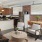 a living room with a brick wall